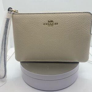 Coach Cream Leather Clutch with Zipper Closure